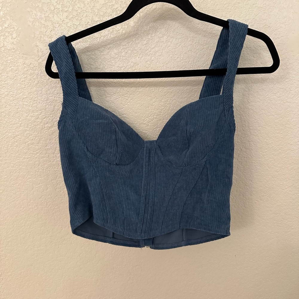 Corset style tip with zipper